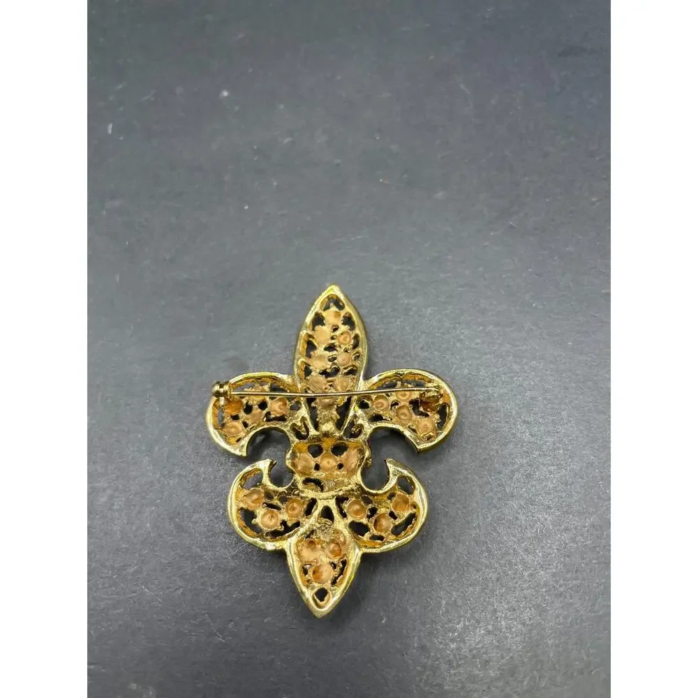Vintage Gold Tone Rhinestone Fleur De Lis Brooch Pin Red Clear Accent Statement